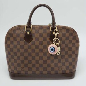 Authentic Louis Vuitton Lock & Key with unbranded Evil Eye Keycharm 011526